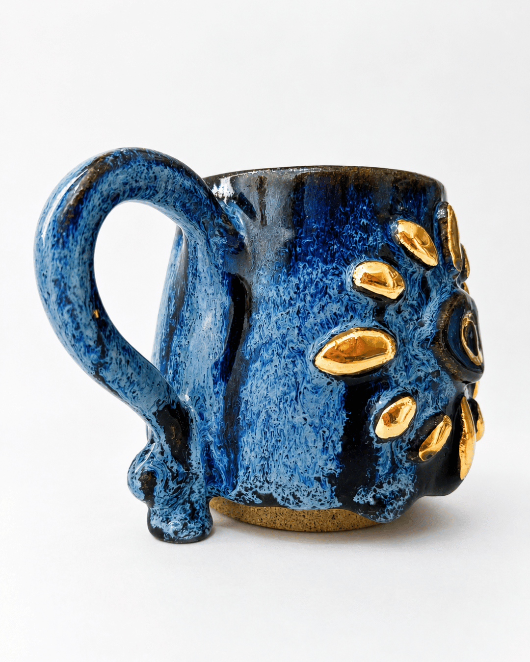 caneca de ceramica olho grego