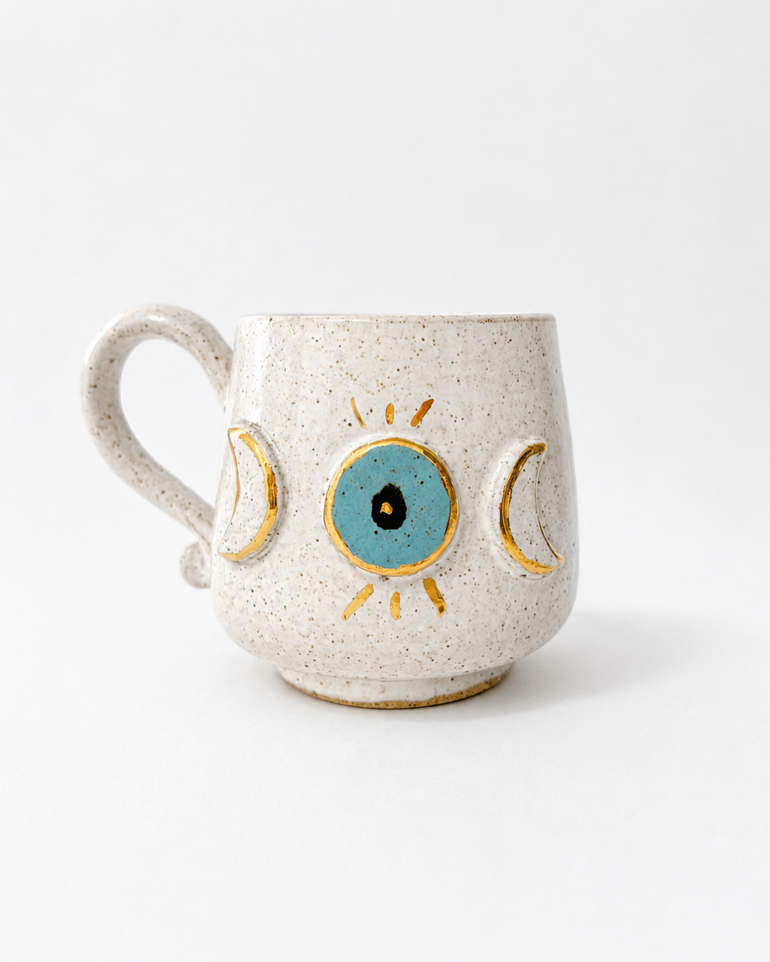 caneca de ceramica olho grego