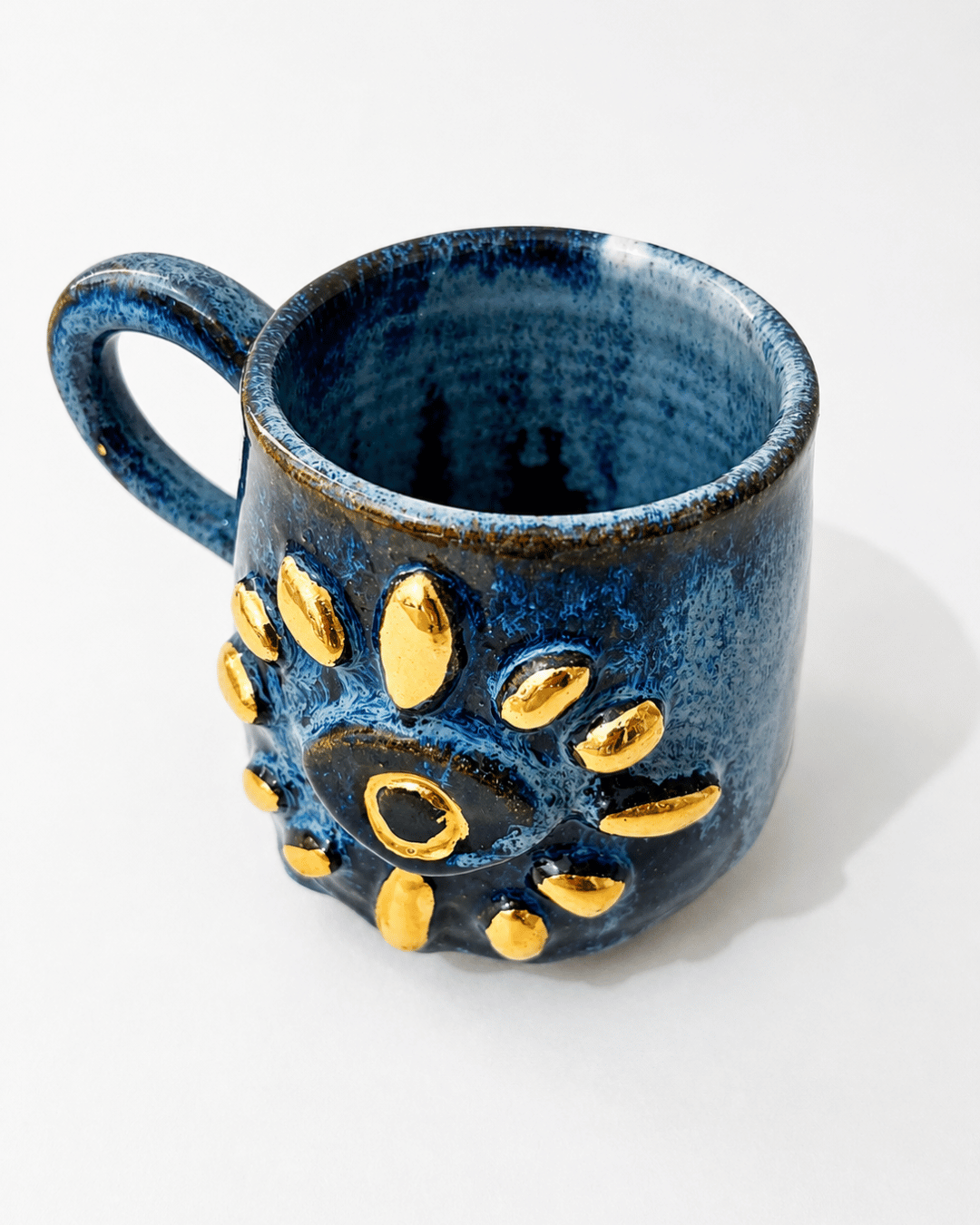 caneca de ceramica olho grego