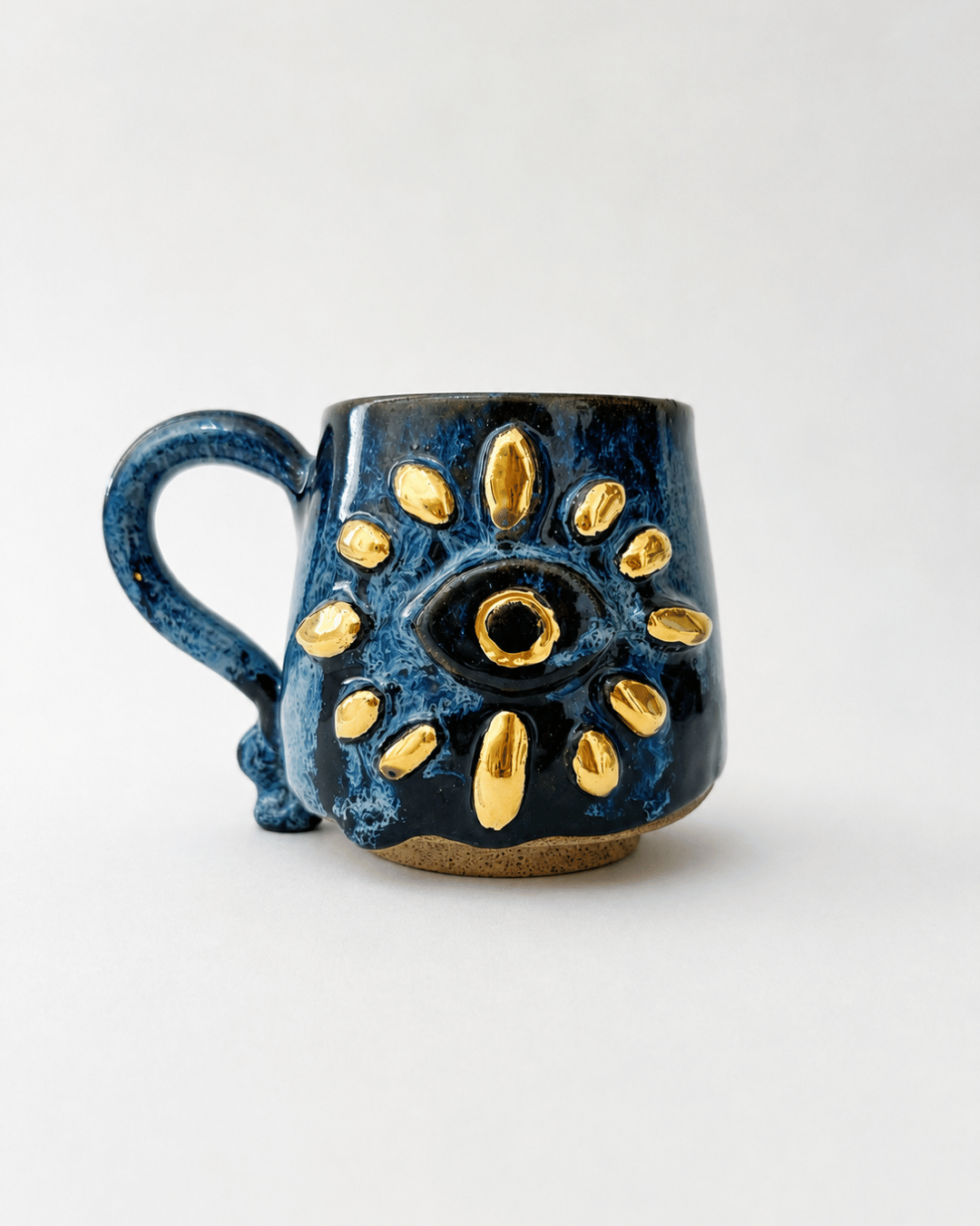 caneca de ceramica olho grego