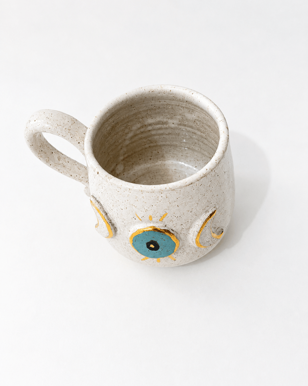 caneca de ceramica olho grego